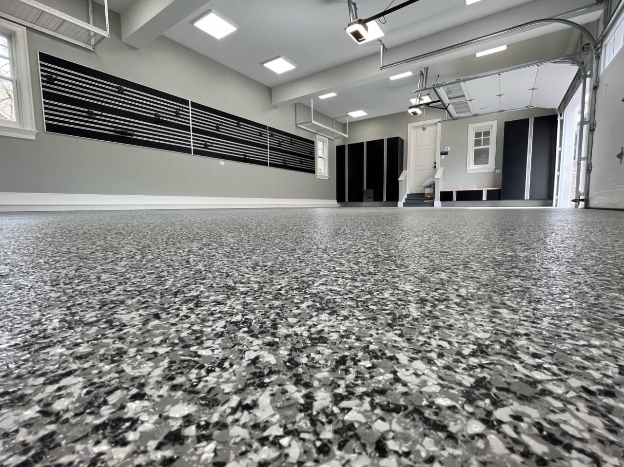 Seamless custom flake pattern polyaspartic floor coating showroom finish