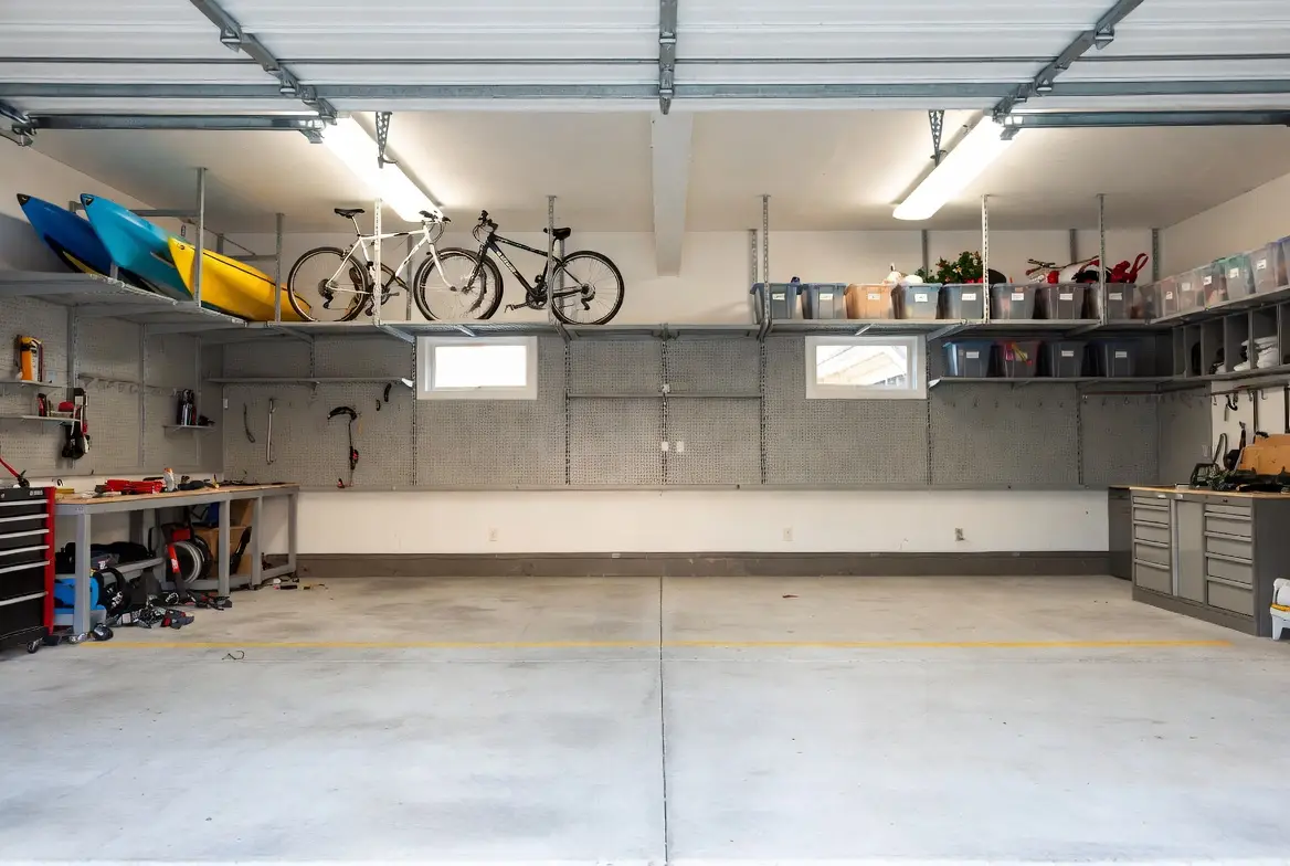 Professional installation of custom garage cabinets and shelving